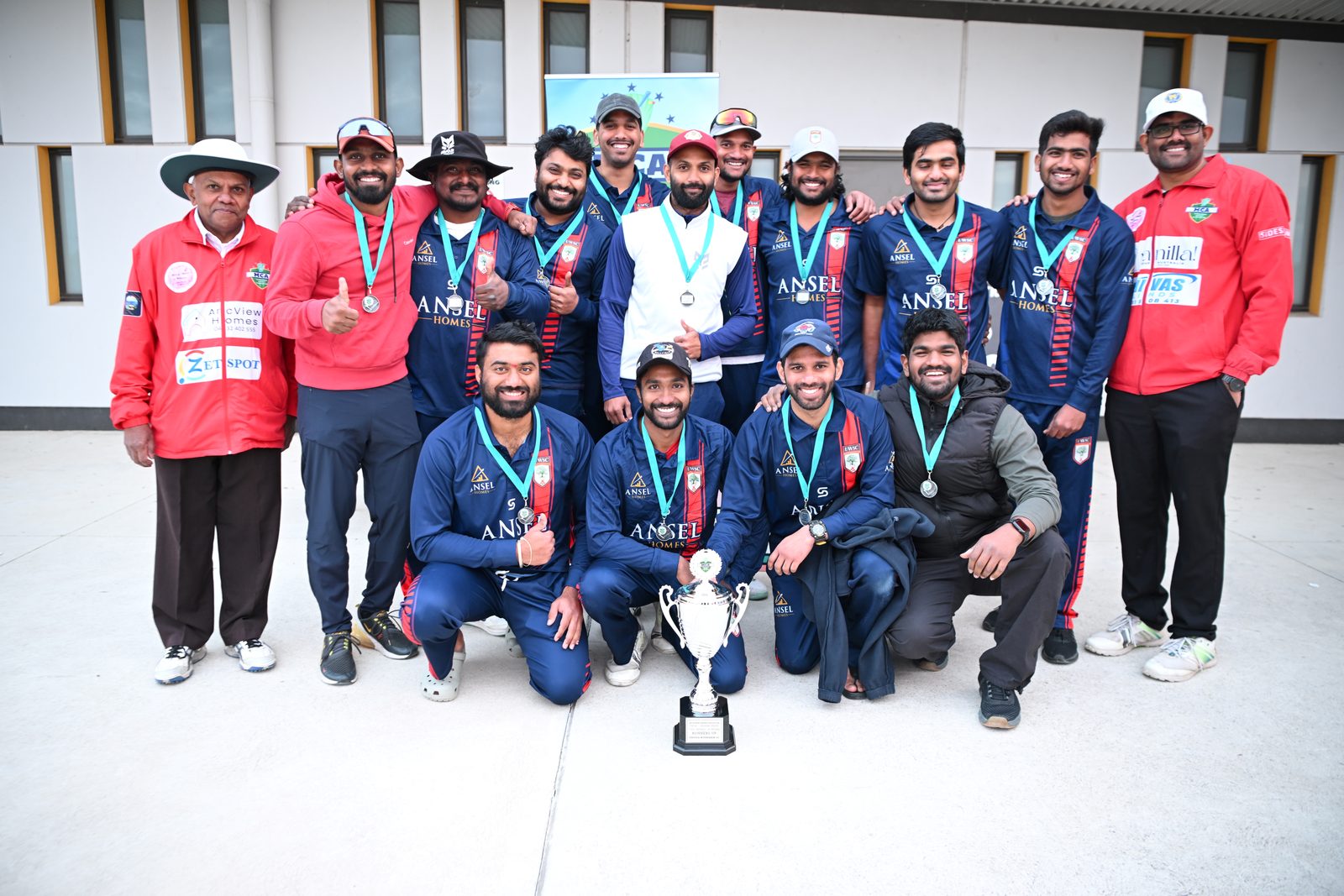 Runners-up team with their trophy and medals after the Winter 2025 final