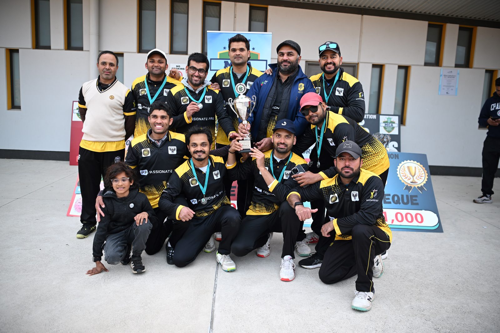 Western Eagles SC with their Winter 2025 T35 12 Rounds B Grade runners-up trophy